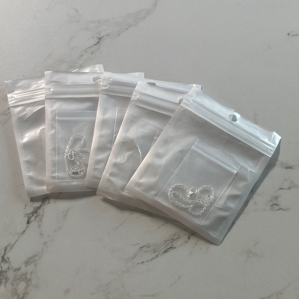 Set of 5 silver bracelets